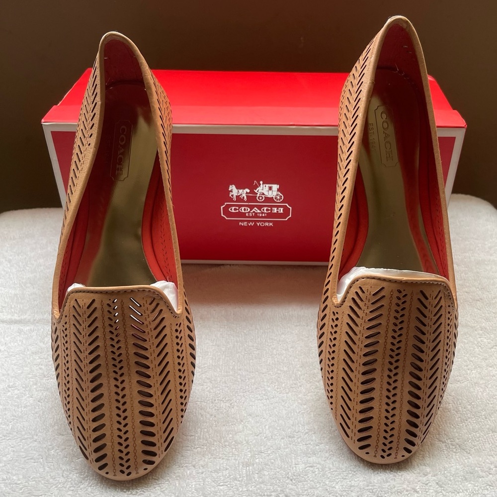 COACH flats. NEW. tan leather flats with detail cut-outs.